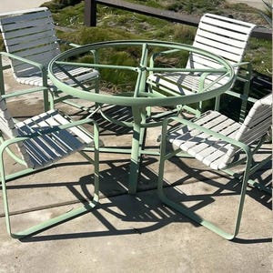 Tropitone Brazilia Patio Lounge chairs and footstool with Vinyl Straps Patio Furniture