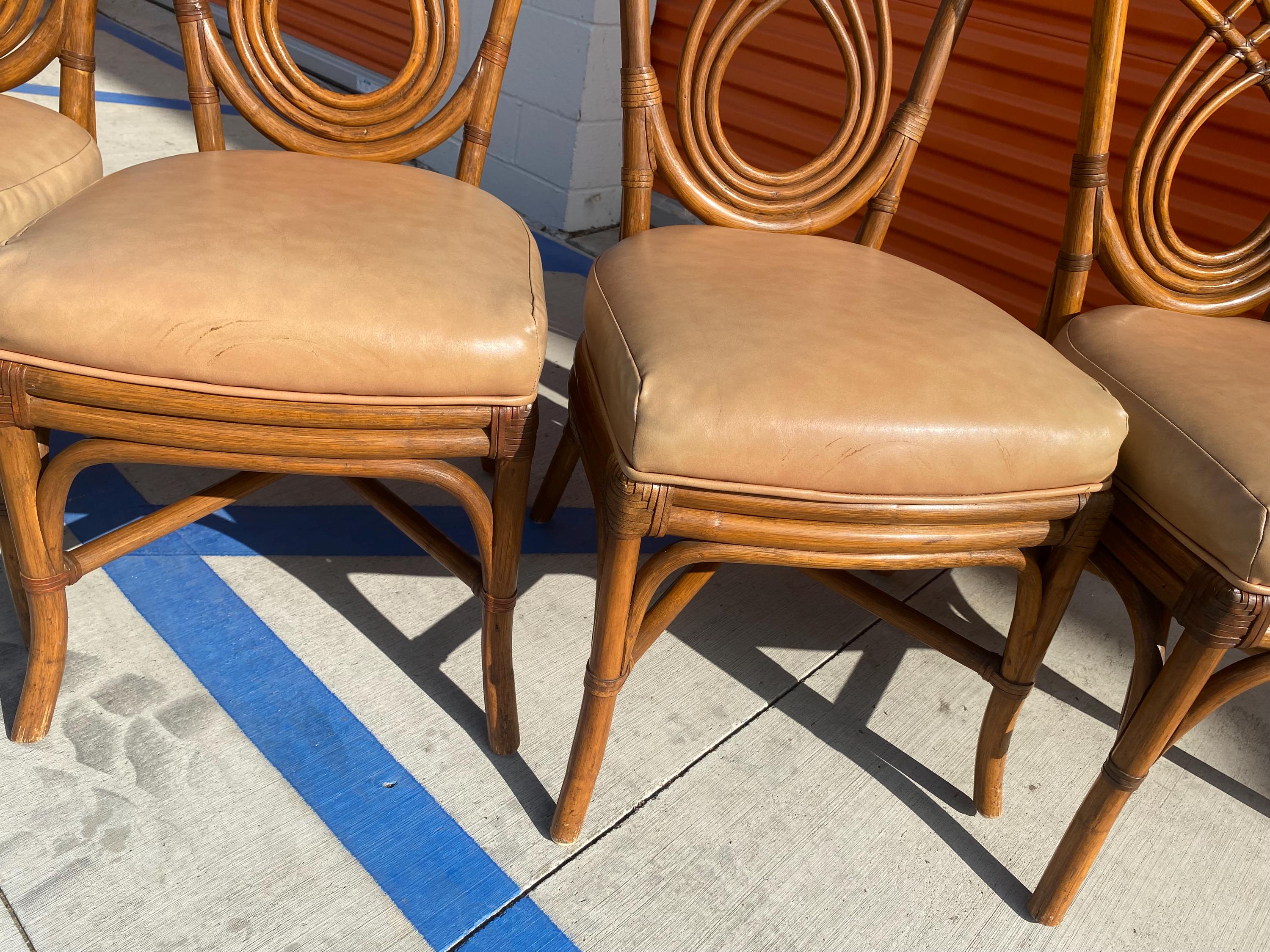 Set of 4 Vintage Rattan and Leather dining chairs