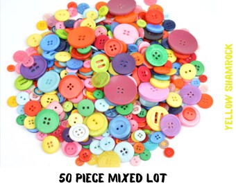 New lots of 100 Buttons assorted mixed color and sizes bulk 1/4 inch to 5/8 in. New lots of 100 Buttons assorted mixed color and sizes bulk 1/4 inch to 5/8 in.