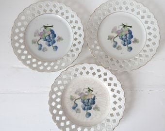 Antique white porcelain dishes with fruit decor Small plates with perforated rim Simple Farmhouse tableware