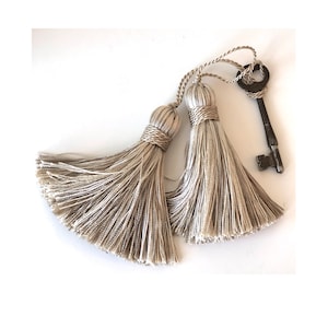Pair of Platinum Decorative Tassels
