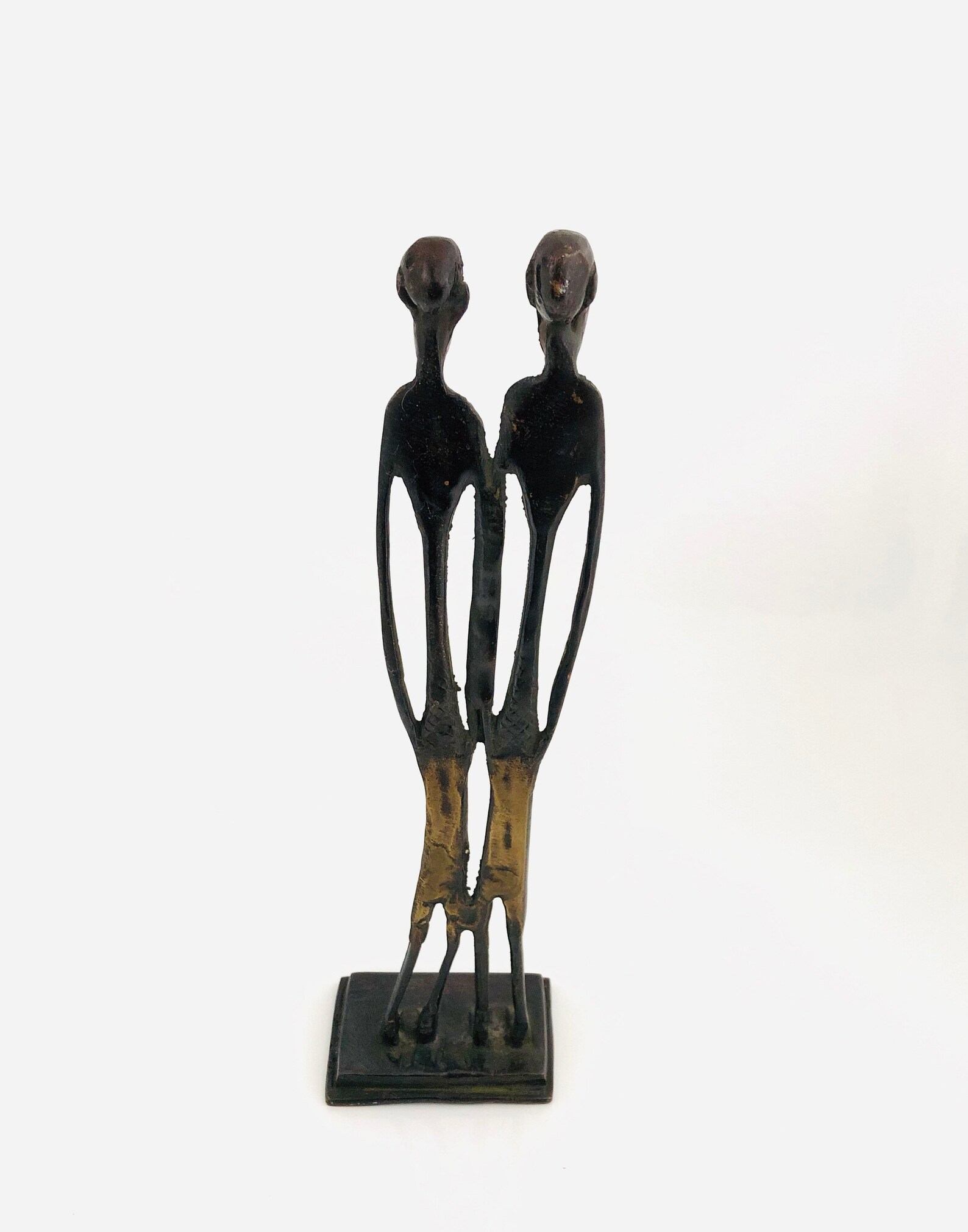 elongated figures in art