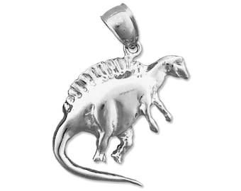 May include: Silver pendant charm in the shape of a dinosaur. The dinosaur is standing on its hind legs with its tail curled around its body.