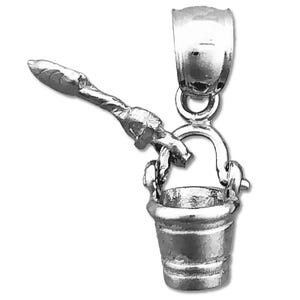 May include: Silver charm in the shape of a bucket and spade. The charm is designed to be attached to a bracelet or necklace.