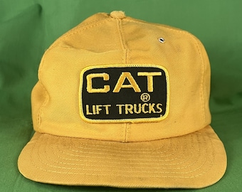 Vintage 70s/80s Cat Lift Trucks Snapback Hat Yellow Adjustable Cap Made in USA Louisville Mfg Co