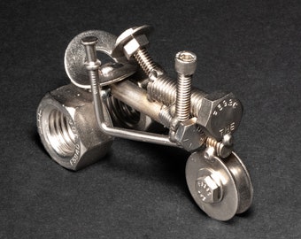 Handmade Scrap Metal Tractor Figurine: Nuts & Bolts Sculpture