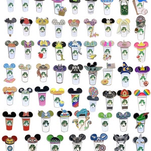 May include: A collection of 64 colourful enamel pins featuring various Disney characters and designs. Each pin depicts a stylised coffee cup with Mickey Mouse ears and a different character or theme on top. The pins are perfect for collectors or fans of Disney.
