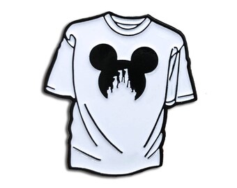 May include: Black and white enamel pin of a white t-shirt with a black Mickey Mouse head silhouette and a black castle silhouette inside the ears.