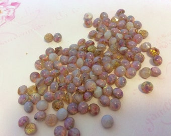 Vintage unfoiled 21SSRound shape Pink Opal slightly pointed back rhinestones Pack of 12 in (4-8mm)