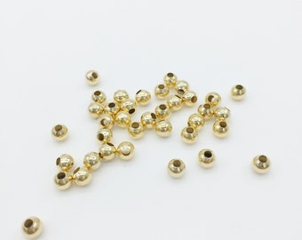 50 x perles d'espacement rondes plaquées or 18 carats, petites entretoises en acier doré, perles d'espacement boule en métal doré de 5 mm (3760)