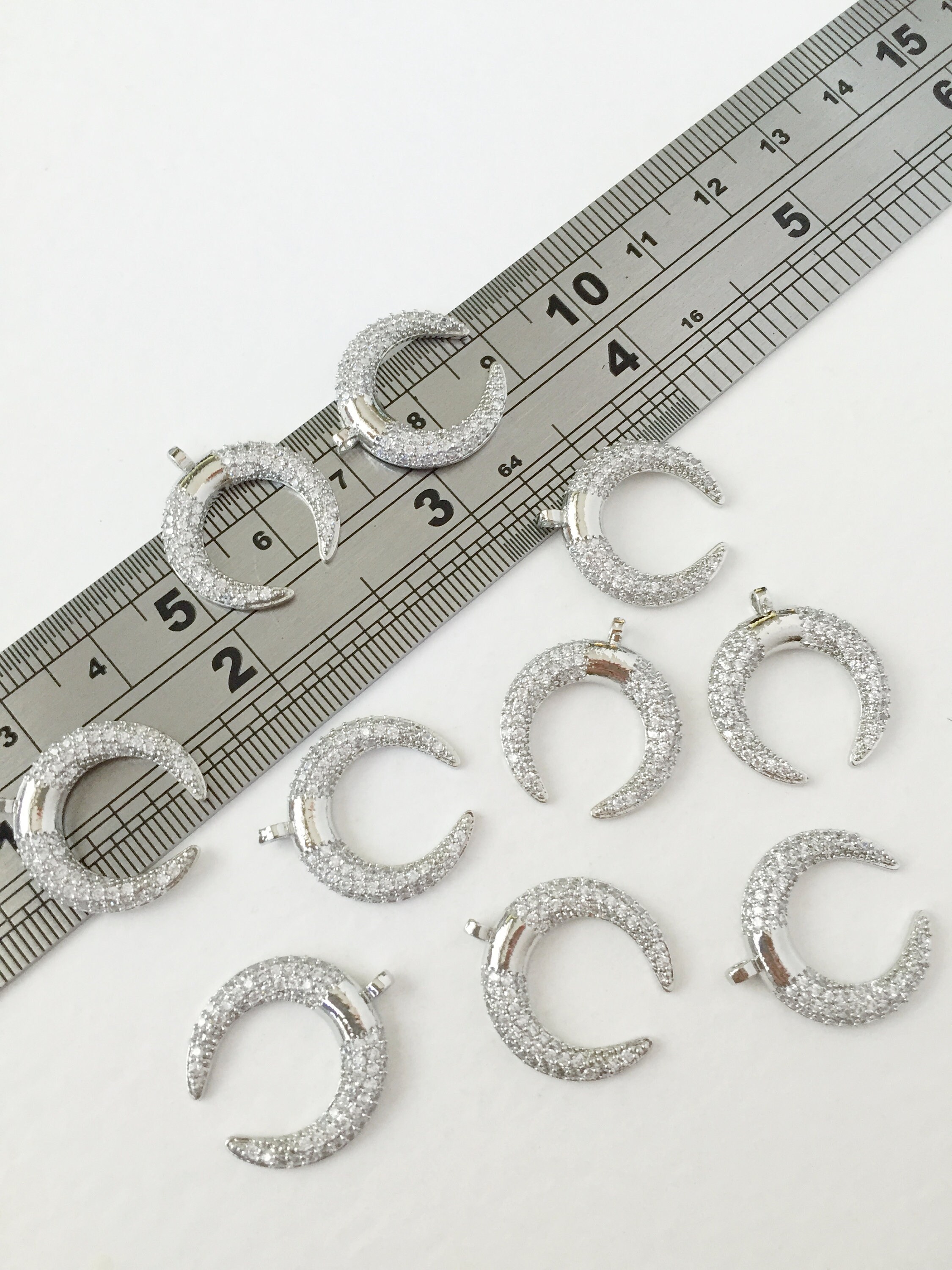 Platinum Plated Crescent Moon Pendant With Cubic Zirconia
