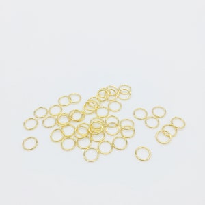 100 x 6x0.7mm 18K Gold Plated Stainless Steel Jump Rings (1090)