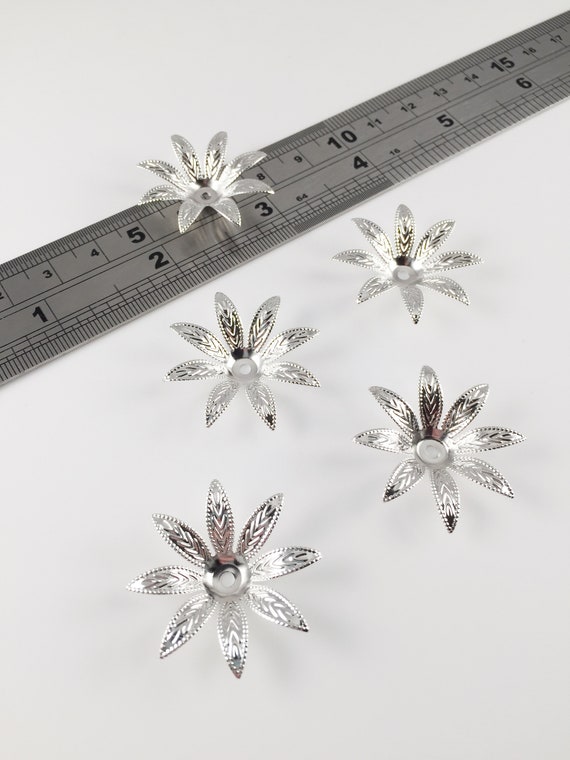 Silver flower best sale beads