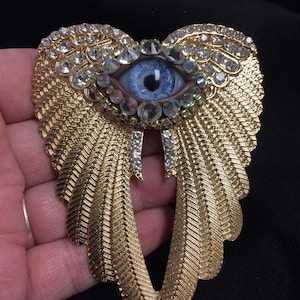 Large Gold Tone Winged Eyeball Art Brooch with a Handmade Blue Glass Iris and Hand Placed Rhinestones!