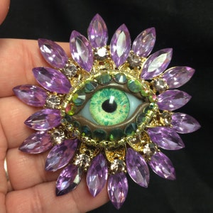 Pastel Purple Vintage Sunburst Style Eyeball Art Brooch with a Handmade Green Glass Iris and Hand Placed Rhinestones!