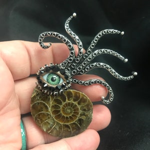 Funky and Fun Ammonite Fossil Sea Creature Eyeball Art Brooch with a Natural Green Eye and Hand Placed Rhinestones! Surreal Eye Jewelry Pin!