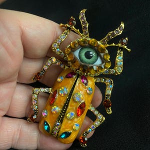 Schiaparelli Inspired Brooches - Etsy