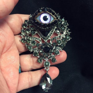 Gothic Black and Gray Vintage Ornate Style Eyeball Art Brooch with a Handmade Violet Glass Iris and Hand Placed Rhinestones!