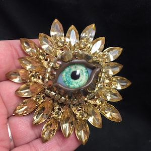 Golden Vintage Sunburst Style Eyeball Art Brooch with a Handmade Green Glass Iris and Hand Placed Rhinestones!