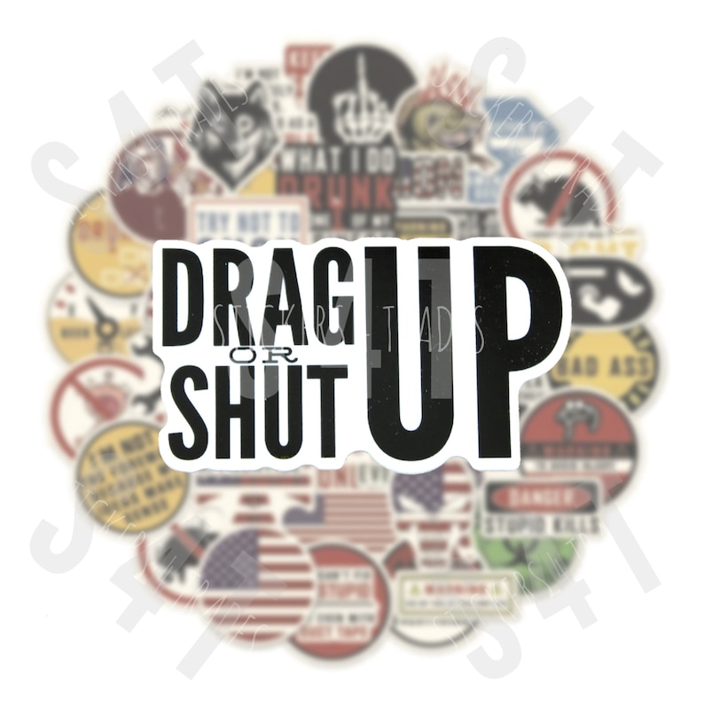 May include: A white sticker with black text that reads "Drag Up or Shut Up". The sticker is surrounded by a variety of other stickers with different designs and text.
