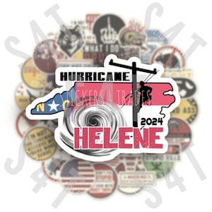 May include: A white sticker with a pink outline of the state of North Carolina. The sticker features a hurricane symbol, the text "Hurricane Helene 2024", and the words "Stickers 4 Trades".