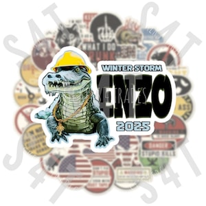 May include: A sticker featuring a cartoon alligator wearing a yellow hard hat and a gold chain. The sticker has the text "Winter Storm Enzo 4 Trades 2025" in black and white.