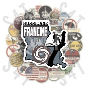 May include: A collection of stickers with various designs. The central sticker features the text "HURRICANE FRANCINE STICKERS 2024" over a depiction of a hurricane and a person climbing a tree. Other stickers have diverse graphics.