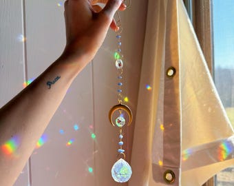 Gold plated, ethereal, blue chalcedony crystal gold moon rainbow prism ball