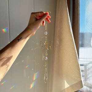 Gold plated, ethereal, peridot crystal, butterfly rainbow prism crystal sun catcher, August birthstone art