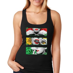May include: A black tank top featuring a graphic print of three women with red lips smoking marijuana. The women are depicted in three separate panels with green, yellow and red backgrounds.
