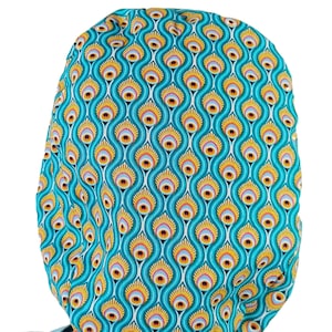 Peacock Scrub CapWoman wearing a peacock scrub cap in Euro style, shown in profile with a bright smile, perfect for women nurses in pediatrics, nephrology, surgery, anesthesia, OBGYN, and medical staff. This doctor scrub hat is available satin lined for hair protection, with optional buttons for masks and personalized embroidery, making it a thoughtful custom doctor gift idea.