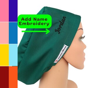 May include: A dark green scrub cap featuring the embroidered name Jordan in black script. A white fabric tag with the text Everyday Heroes is sewn onto the side. A bright green graphic overlay includes the text Add Name Embroidery.