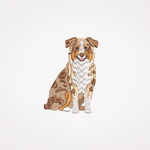 May include: An embroidered patch featuring a sitting Australian Shepherd dog with a merle coat pattern in shades of brown, tan, and white. The dog has a white chest, a pink tongue visible, and dark brown ears, rendered in detailed thread work.