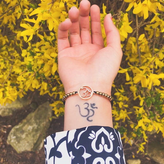 Om bracelet deals gold