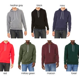May include: A set of ten hooded sweatshirts in various colors, including heather gray, black, navy, red, military green, maroon, and forest green. The sweatshirts are all the same style, with a drawstring hood and a kangaroo pocket.