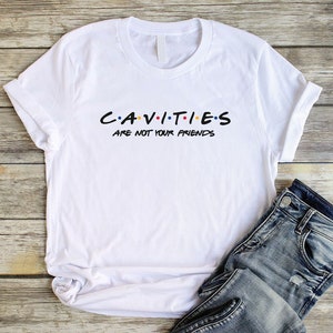 Cavities Are Not Your Friends Shirt Unisex Dentist Shirt Dental Floss T Shirt Funny Dentist Tshirt Dental Hygienist Gift Dental Assistant white w/ black logo