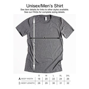 May include: A size chart for a unisex shirt showing the body width and body length measurements in inches for sizes S, M, L, XL, and 2XL.