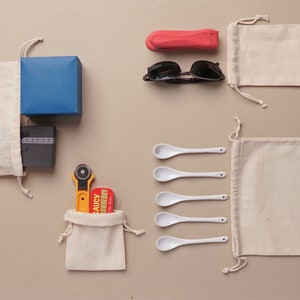 cotton muslin bags are perfect for a variety of uses, whether you need a cotton storage bag for organizing, gift bags for special occasions, or craft bags for creative projects, we have you covered. Wedding favor bags add a charming touch to any event. Keep your groceries fresh with produce bags and accessories in jewelry bags, or protect your seeds with seed bags. Ideal for herbs, our herb bags help preserve freshness, Our versatile collection meets all your storage and packaging needs