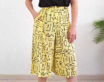 Pantaloni culottes a gamba larga vintage anni '90 e '80, pantaloni pantaloncini a gamba larga astratti a vita alta, pantaloni gonna retrò anni '80, pantaloncini culottes plissettati vintage