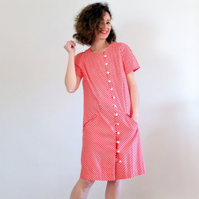 red polka dot button down dress