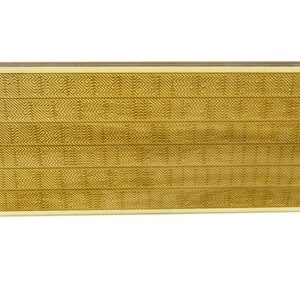 May include: A rectangular wooden cutting board with a textured surface. The board is light brown in color and has a slightly raised edge.