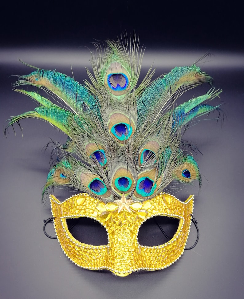 Peacock feathers mask with yellow rhinestones