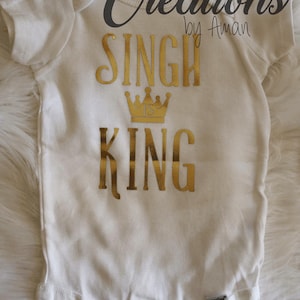 Singh is King baby onesie