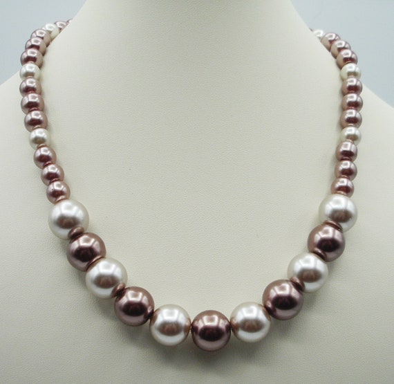 Necklace with bead in the deals middle