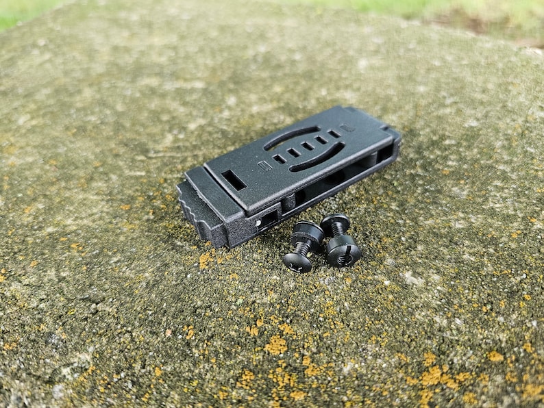 May include: Black plastic knife sheath with two black screws.