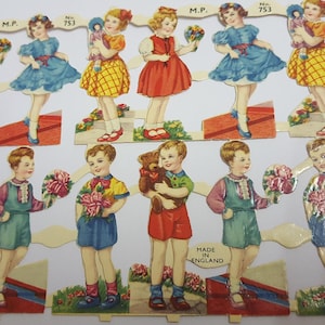 12 kinderen met bloemen, teddybeer en pop VINTAGE Mamelok nr. 753 gestanste papiersnippers