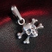 see more listings in the Skull Rings & Pendants section