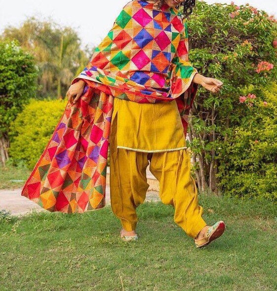 Phulkari suit #Phulkari #sharara #punjabisuit | Designer suits for wedding,  Haldi dress ideas, Indian fashion dresses