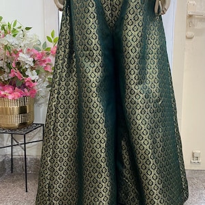 1990's to early 2000's cropped palazzo pants, or gauchos black w/ gold buttons and wide leg