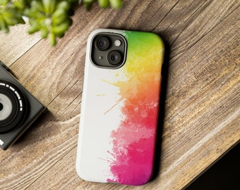 May include: A white phone case with a colorful watercolor design. The design features a gradient of colors, starting with green at the top and transitioning to pink at the bottom. The colors are blended together in a way that creates a soft, ethereal look.